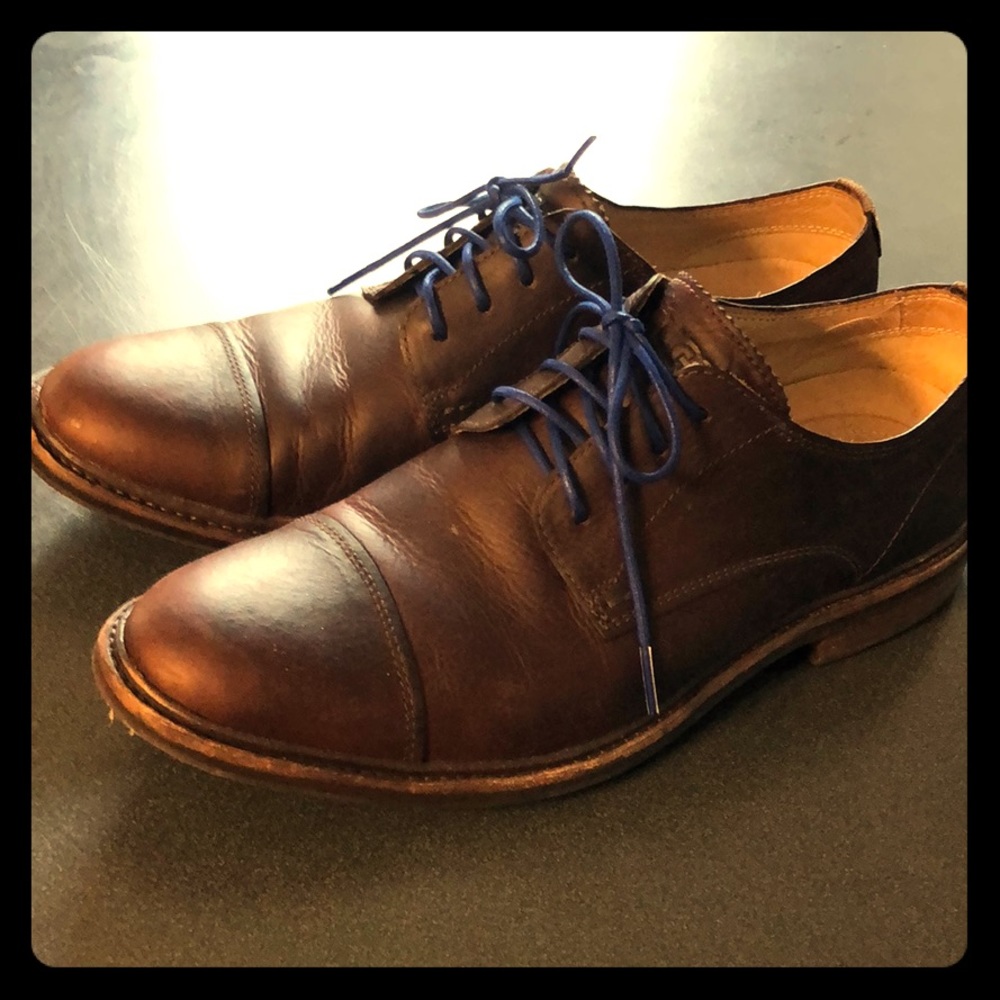 Uggs Loafers with Blue laces.